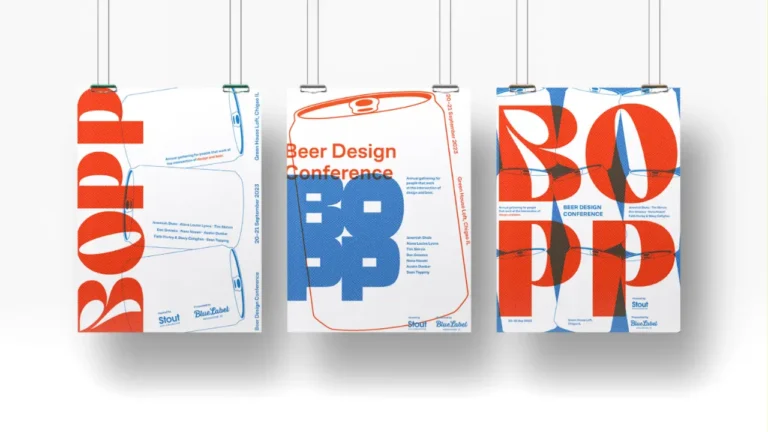 Three hanging posters promote the 