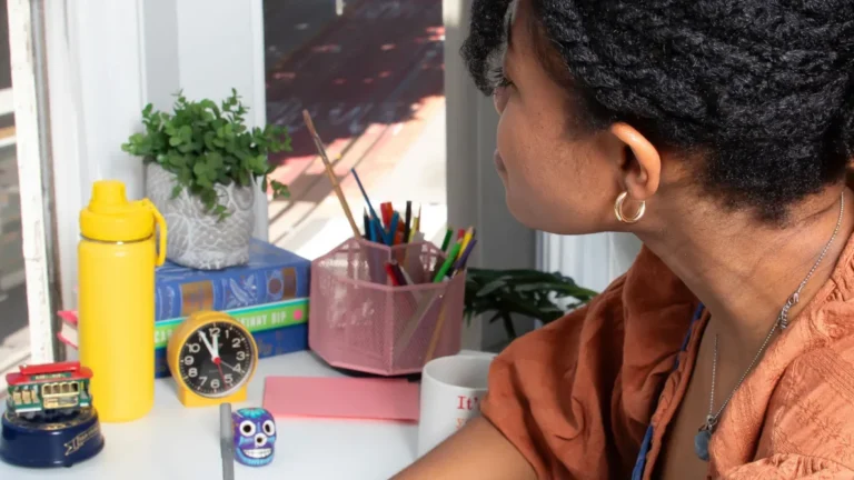 Looking out a window at the city below