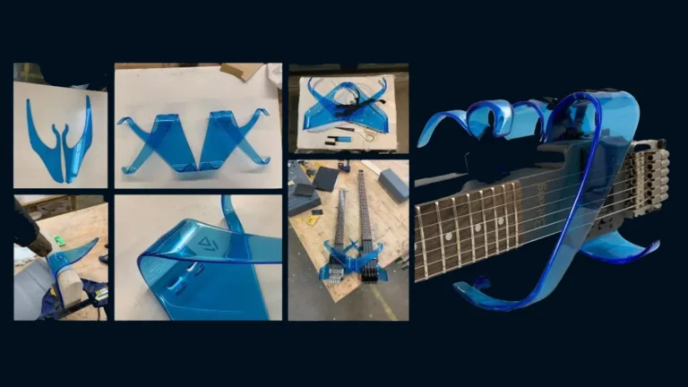 Assembly of a blue plastic guitar body and neck components on a workbench.