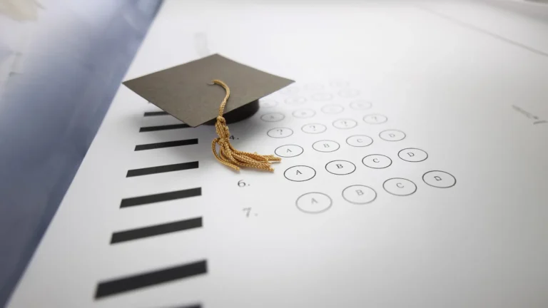 Graduation cap on multiple-choice answer sheet, Placement by Test Transfer Students Academy of Art University