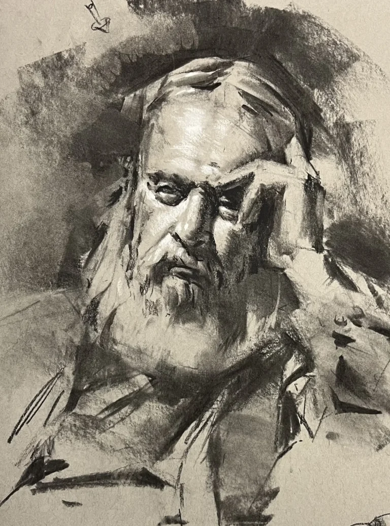 A bearded man with a troubled expression rests his head on his hand.