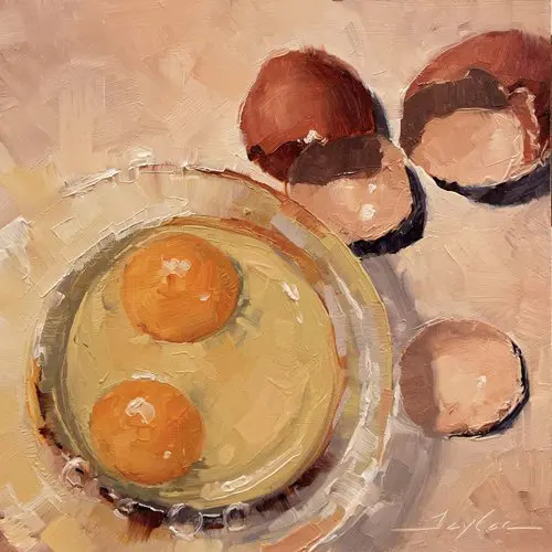 Two sunny-side dishes in a bowl with two oranges nearby on pastel background
