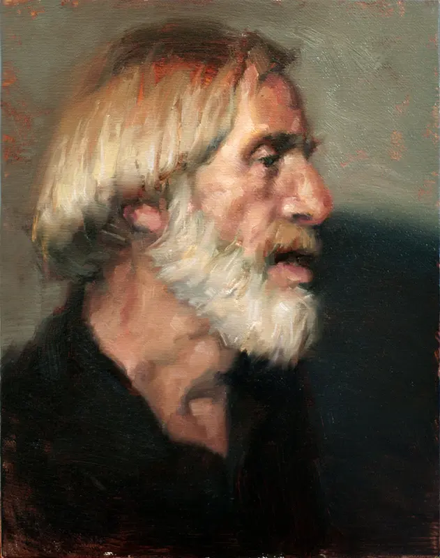 Profile of an older man with white beard, looking right.