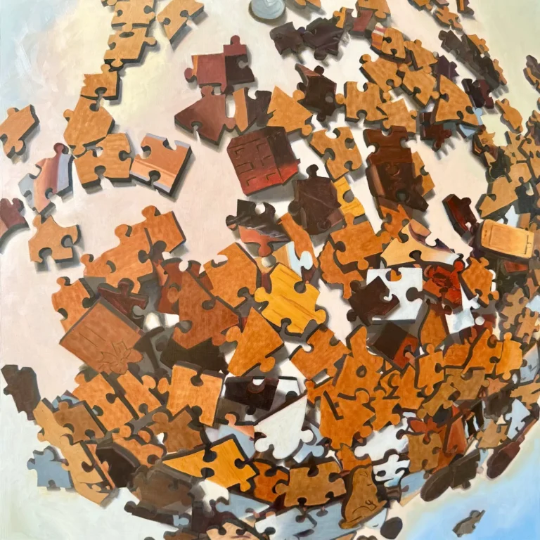 Scattered orange and brown puzzle pieces on a light background