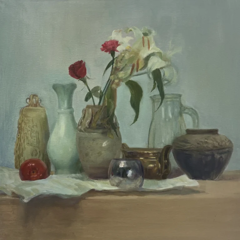 Still life with red roses and assorted vases on a table against a pale blue-green backdrop.