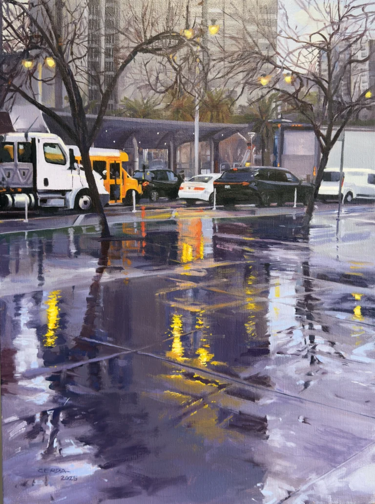Rain-slick street with reflected yellow lights and bare trees, cityscape.