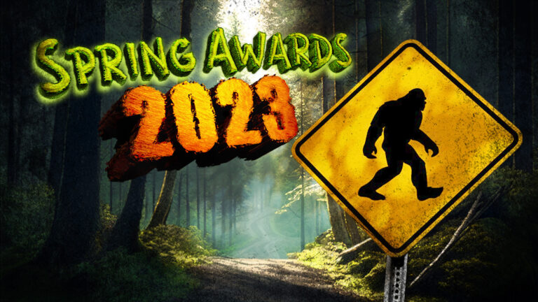 A yellow road sign with a Bigfoot silhouette stands beside a forest path. Text above reads 