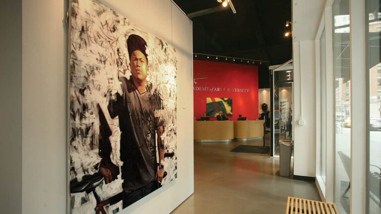 Painting of a person stands on the left wall, surrounded by abstract graffiti. In the background, a red wall displays 